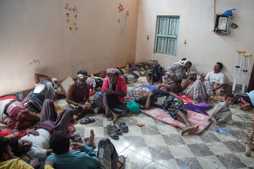 Displaced Yemenis rest at a temporary shelter in the Dar Saad district of Aden, Yemen, Saturday, Sept. 12, 2026, after fleeing Houthi attacks in the western coastal cities of al-Khokha and Mokha. (AP Photo/Abdulnasser Alseddik)
