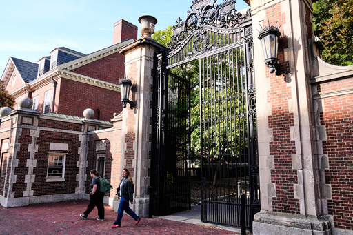 Two women walk through a gate from Harvard Yard at Harvard University, Tuesday, Sept. 30, 2025, in Cambridge, Mass. (AP Photo/Charles Krupa) Two women walk through a gate from Harvard Yard at Harvard University, Tuesday, Sept. 30, 2025, in Cambridge, Mass. (AP Photo/Charles Krupa)