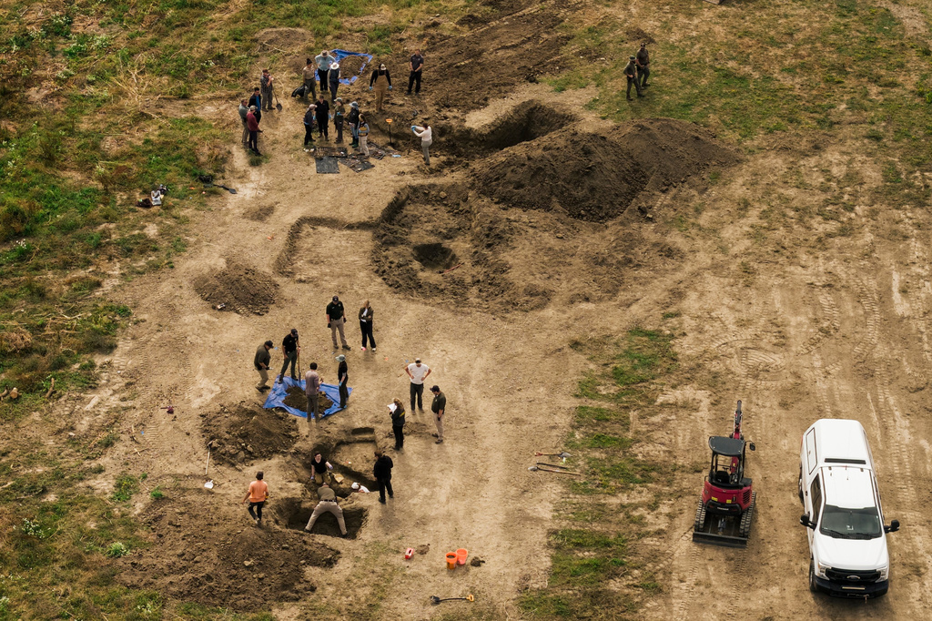 In an aerial view, investigators search for animal remains while executing a second search warrant at Miranda's Rescue as part of an active investigation into alleged animal cruelty, fraud, and theft, in Fortuna, Calif., on Tuesday, June 23, 2026. (Stephen Lam/San Francisco Chronicle via AP)