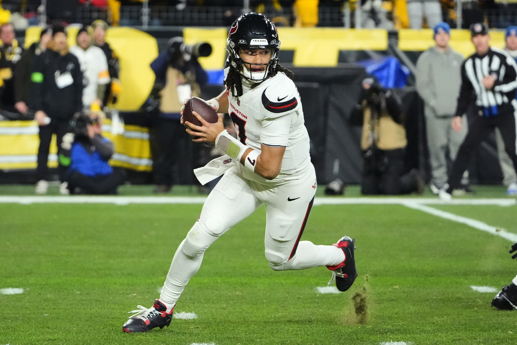 Houston Texans quarterback C.J. Stroud looks for a receiver during the first half of NFL wild-card playoff football game against the Pittsburgh Steelers, Monday, Jan. 12, 2026, in Pittsburgh. (AP Photo/Gene J. Puskar)