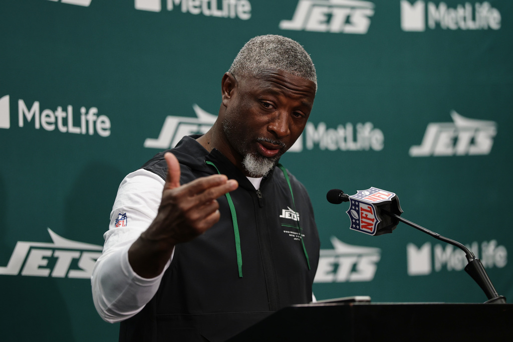 New York Jets head coach Aaron Glenn speaks during a news conference following an NFL football game against the Green Bay Packers in East Rutherford, N.J., Sunday, Sept. 20, 2026. (AP Photo/Adam Hunger)