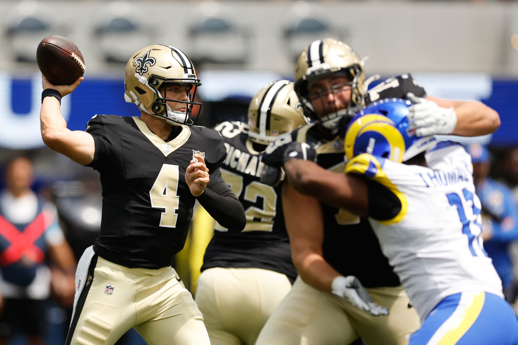 New Orleans Saints quarterback Zach Wilson throws a pass during the first half an NFL preseason football game against the Los Angeles Rams Saturday, Aug. 22, 2026, in Inglewood, Calif. (AP Photo/Caroline Brehman)