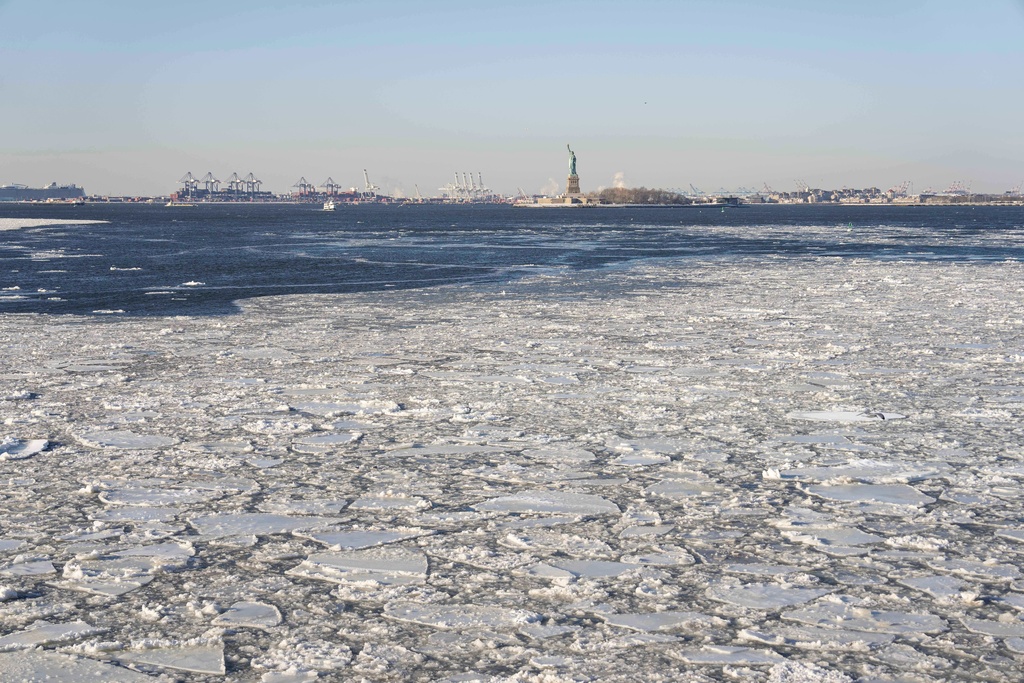 Ice floats on the Hudson River seen on the Staten Island Ferry, Tuesday, Jan. 27, 2026, in New York. (AP Photo/Yuki Iwamura)