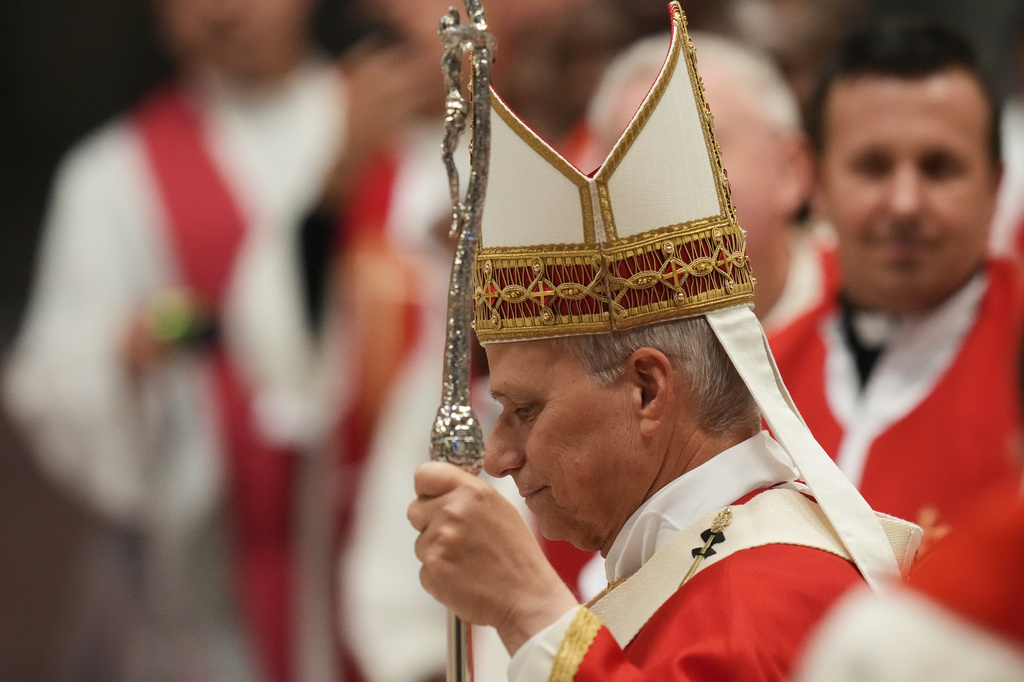 Pope Leo XIV arrives to celebrate a mass in St. Peter's Basilica at the Vatican, Thursday, Oct.8, 2026, for the annual opening of the academic year at pontifical universities, joining Rome's 22 pontifical institutions and numerous others worldwide. (AP Photo/Gregorio Borgia)