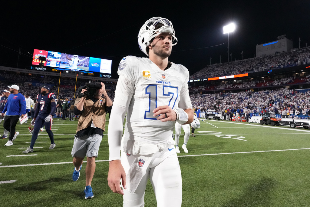 Buffalo Bills quarterback Josh Allen (17) walks off the field after the team's loss to the New England Patriots in an NFL football game, Sunday, Sept. 5, 2025, in Orchard Park, N.Y. (AP Photo/Gene J. Puskar)