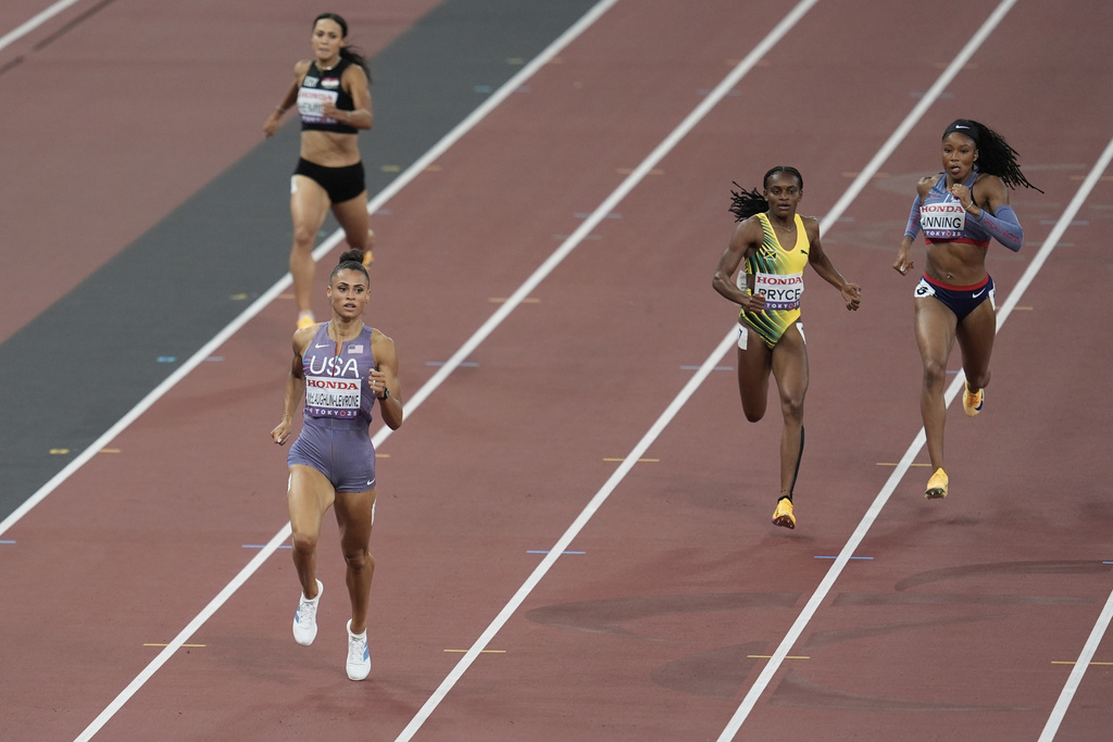 United States' Sydney McLaughlin-Levrone, front, competes in the women's 400 meters semifinal at the World Athletics Championships in Tokyo, Tuesday, Sept. 16, 2025. (AP Photo/Abbie Parr)