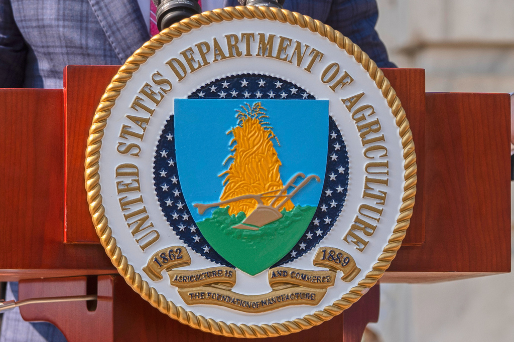 FILE - The U.S. Department of Agriculture seal is seen on a podium during a news conference in Washington on July 8, 2025. (AP Photo/Manuel Balce Ceneta, File)