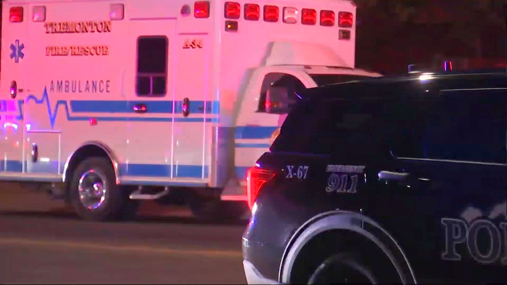 In this image made from video provided by KTVX, police at the scene of a shooting in Tremonton, Ut., Sunday, Aug. 17, 2025. (KTVX via AP)