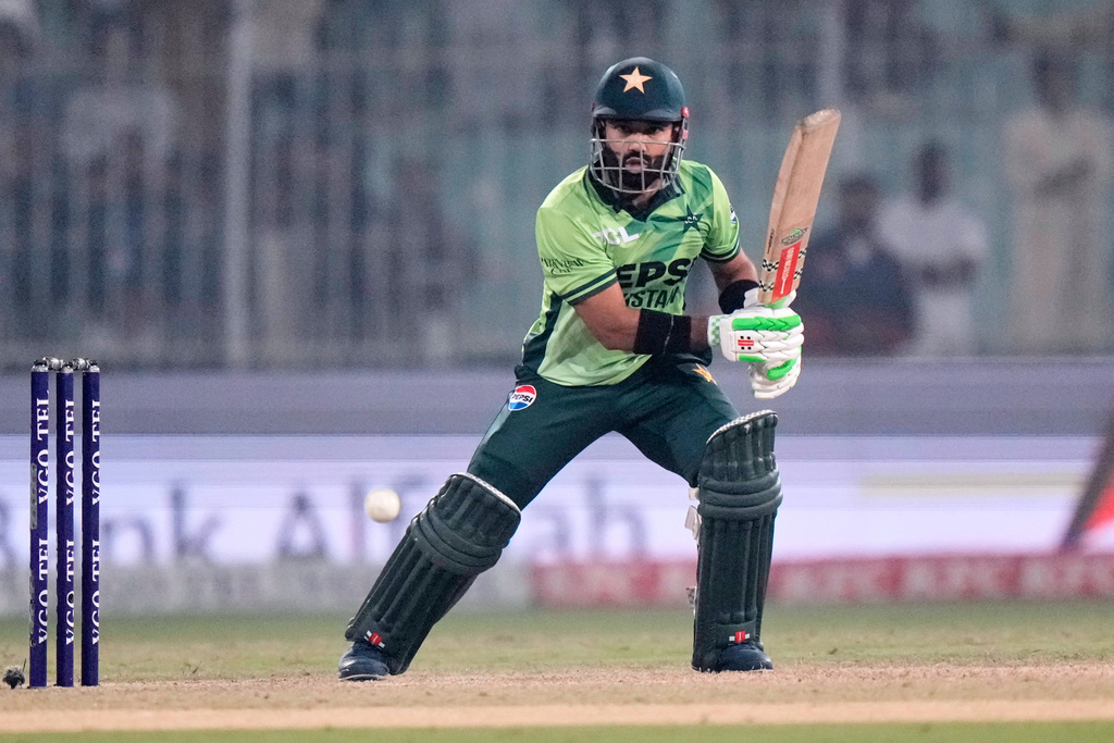 Pakistan's Mohammad Rizwan plays a shot during the first one day international cricket match between Pakistan and South Africa, in Faisalabad, Pakistan, Tuesday, Nov. 4, 2025. (AP Photo/Anjum Naveed)