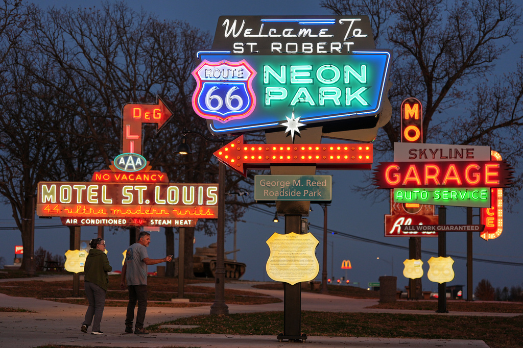 Terry and Christie Partee visit Route 66 Neon Park inside George M. Reed Roadside Park along historic Route 66 in St. Robert, Mo., Tuesday, Nov. 18, 2025. (AP Photo/Jeff Roberson)