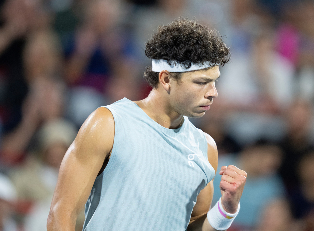Ben Shelton of the United States reacts during his match against compatriot Brandon Nakashima during the final tennis match of the National Bank Open in Montreal, Thursday, Aug. 13, 2026. (Christinne Muschi/The Canadian Press via AP)