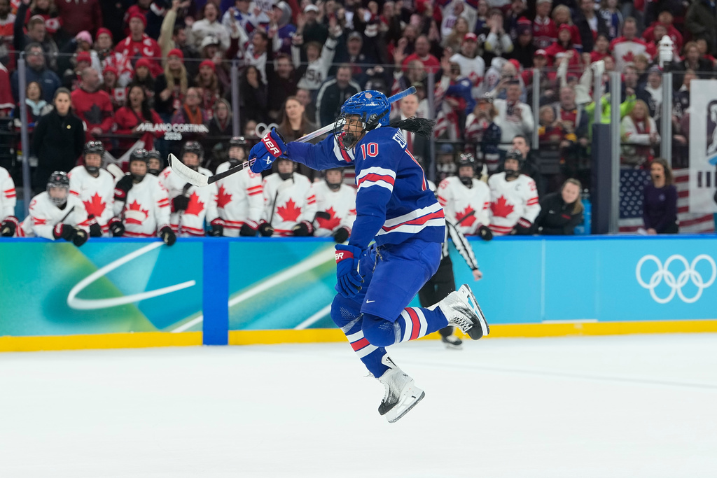 United States' Laila Edwards (10) celebrates as United States' Hilary Knight (21) scored an equalizer during a women's ice hockey gold medal game between the United States and Canada at the 2026 Winter Olympics, in Milan, Italy, Thursday, Feb. 19, 2026. (AP Photo/Petr David Josek)