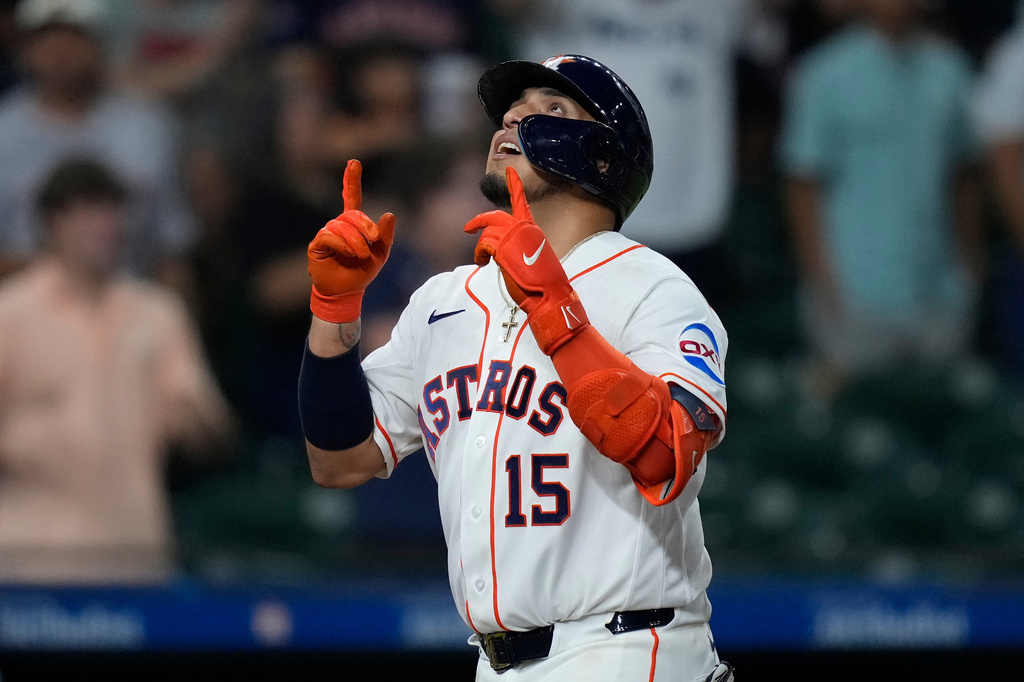 Houston Astros' Isaac Paredes celebrates after hitting a solo home run during the eighth inning of a baseball game against the Miami Marlins, Wednesday, July 22, 2026, in Houston. (AP Photo/Kevin M. Cox)