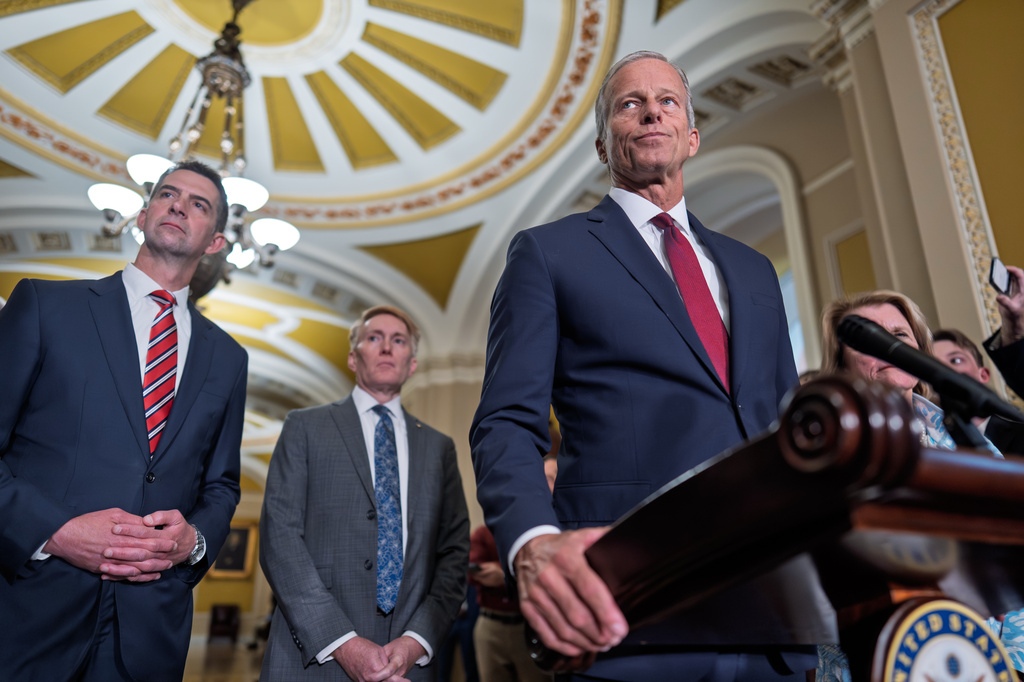 Senate Majority Leader John Thune, R-S.D., joined from left by Sen. Josh Hawley, R-Mo., and Sen. James Lankford, R-Okla., speaks to reporters after a closed-door meeting with fellow Republicans, at the Capitol in Washington, Tuesday, June 2, 2026. (AP Photo/J. Scott Applewhite)