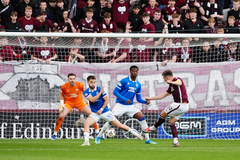 Heart of Midlothian's Lawrence Shankland scores a goal during the William Hill Premiership match at Tynecastle Park, Edinburgh, Monday, May 4, 2026. (Andrew Milligan/PA via AP)