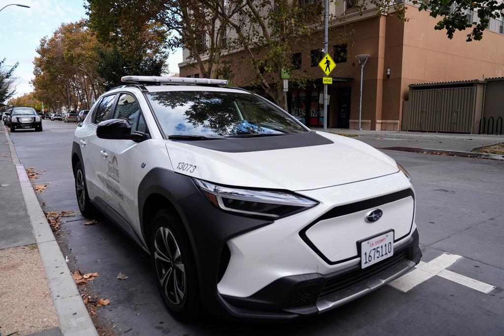 This City of San Jose parking enforcement vehicle is one of two equipped with a small detection camera that can detect road hazards and potholes, in San Jose, Calif., Wednesday, Nov. 12, 2025. (AP Photo/Godofredo A. Vásquez)