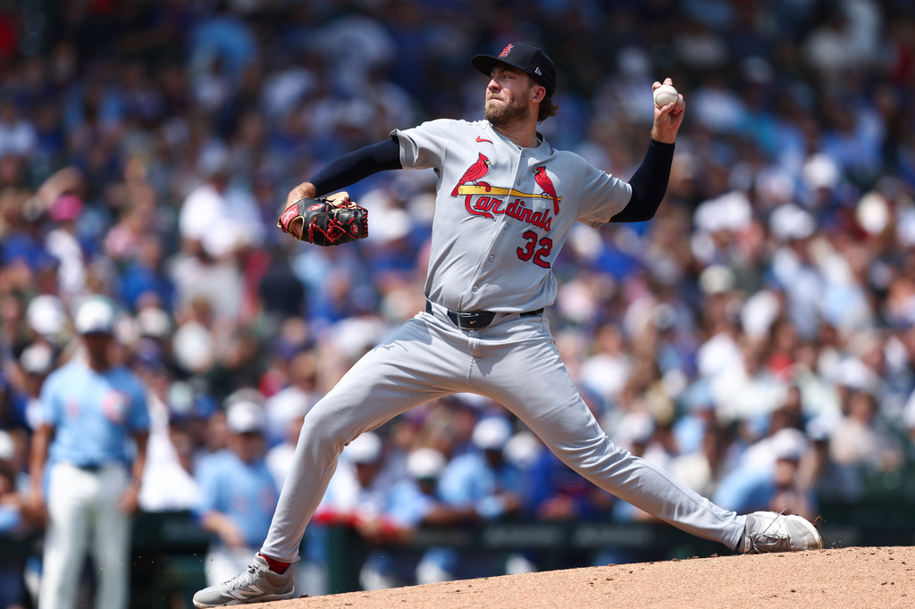 St. Louis Cardinals pitcher Matthew Liberatore (32) throws to a Chicago Cubs batter during the first inning of a baseball game in Chicago, Friday, Aug. 14, 2026. (AP Photo/Jessie Alcheh)