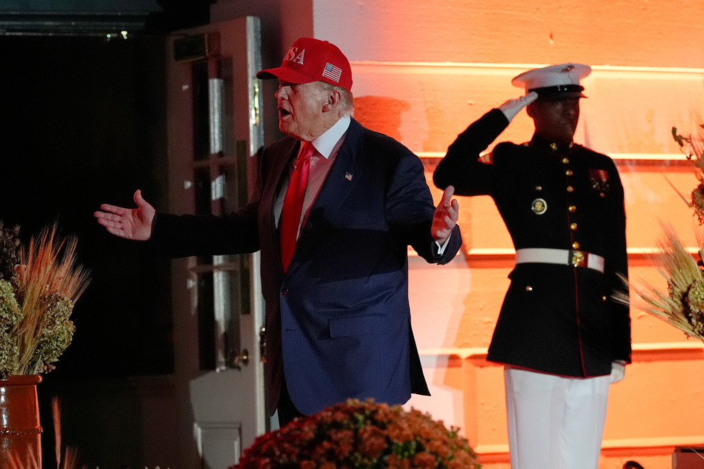 President Donald Trump gestures before departing a Halloween at the White House event on the South Lawn, Thursday, Oct. 30, 2025, in Washington. (AP Photo/Alex Brandon)