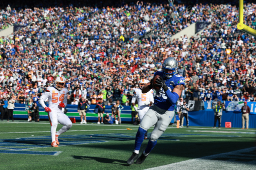 Seattle Seahawks tight end AJ Barner (88) scores a touchdown during the second half of an NFL football game against the Tampa Bay Buccaneers, Sunday, Oct. 5, 2025, in Seattle. (AP Photo/Maddy Grassy) Seattle Seahawks tight end AJ Barner (88) scores a touchdown during the second half of an NFL football game against the Tampa Bay Buccaneers, Sunday, Oct. 5, 2025, in Seattle. (AP Photo/Maddy Grassy)
