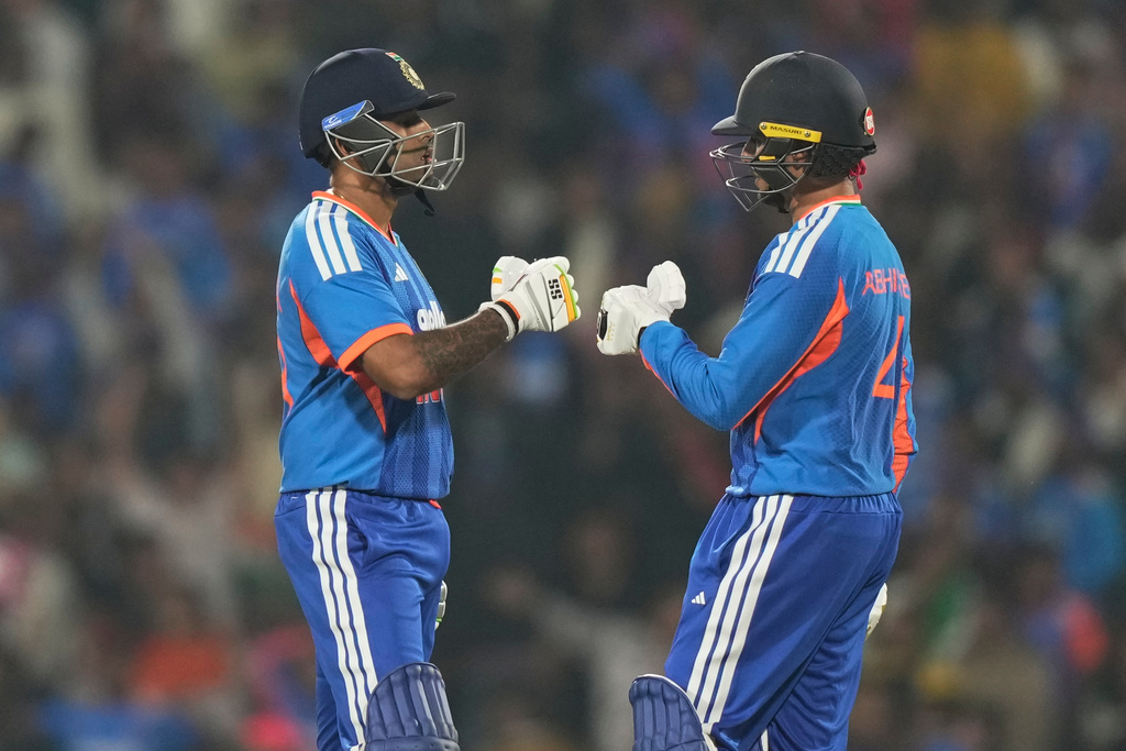 India's captain Suryakumar Yadav, left, and batting partner Abhishek Sharma encourage each other during the first T20 cricket match between India and New Zealand in Nagpur, India, Wednesday, Jan. 21, 2026. (AP Photo/Mahesh Kumar A.)