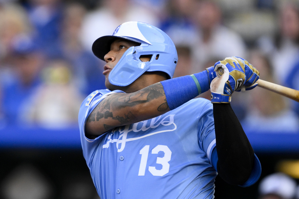 Kansas City Royals' Salvador Perez watches his three-run home run sail into the stands during the first inning of a baseball game against the Minnesota Twins in Kansas City, Mo., Saturday, Sept. 6, 2025. (AP Photo/Reed Hoffmann)