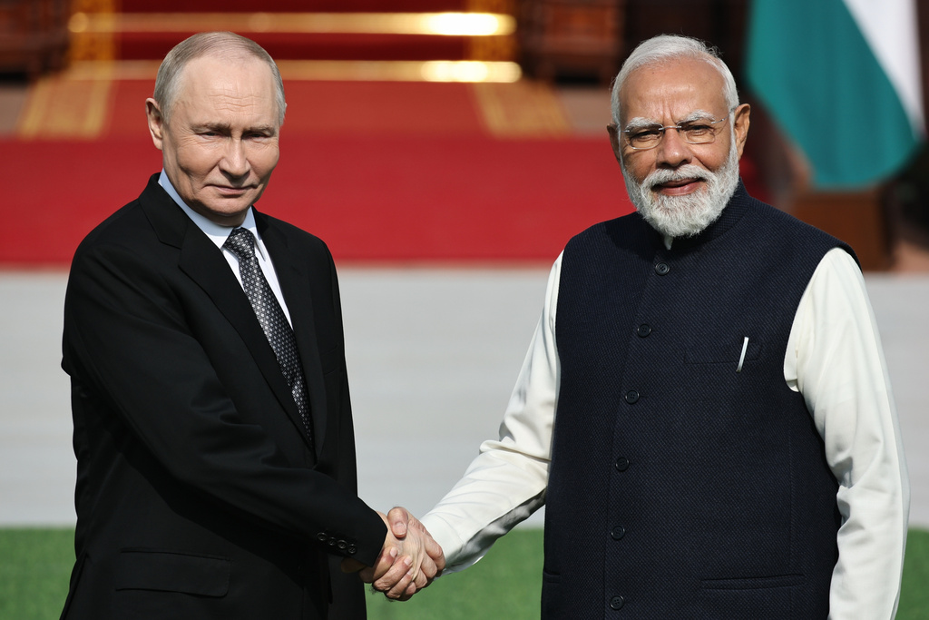 Russian President Vladimir Putin, left, and Indian Prime Minister Narendra Modi pose for a photo prior to their talks in New Delhi, India, Friday, Dec. 5, 2025. (Mikhail Tereshchenko, Sputnik, Kremlin Pool Photo via AP)
