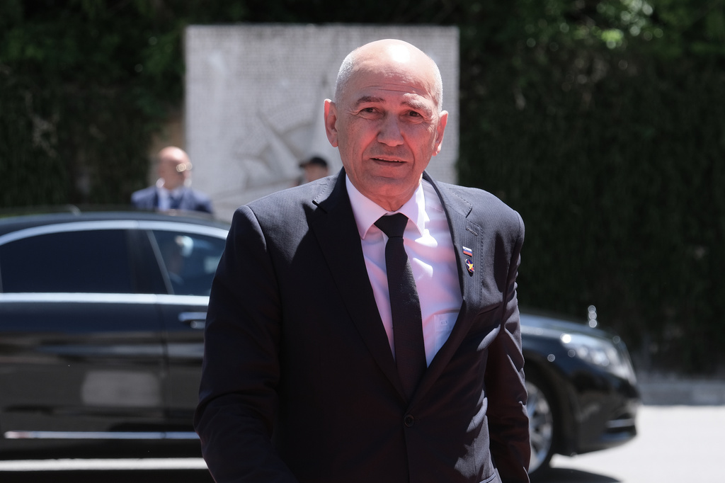 Slovenia's Prime Minister Janez Jansa arrives to attend the EU-Western Balkans summit in Tivat, Montenegro, Friday, June 5, 2026. (AP Photo/Risto Bozovic)