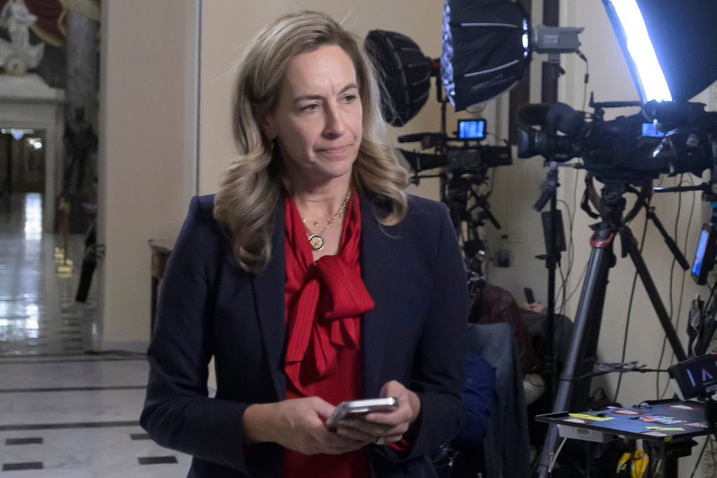 FILE - New Jersey Gov.-elect Rep. Mikie Sherrill, D-N.J., left, prepares for a television interview at the U.S. Capitol, Wednesday, Nov. 12, 2025, in Washington. (AP Photo/Rod Lamkey, Jr., File)