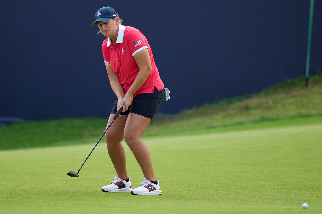 Lauren Coughlin of the United States reacts as she misses a putt on the 15th green during the final day of the Solheim Cup in Den Bosch, Netherlands, Sunday, Sept. 13, 2026. (AP Photo/Alastair Grant)