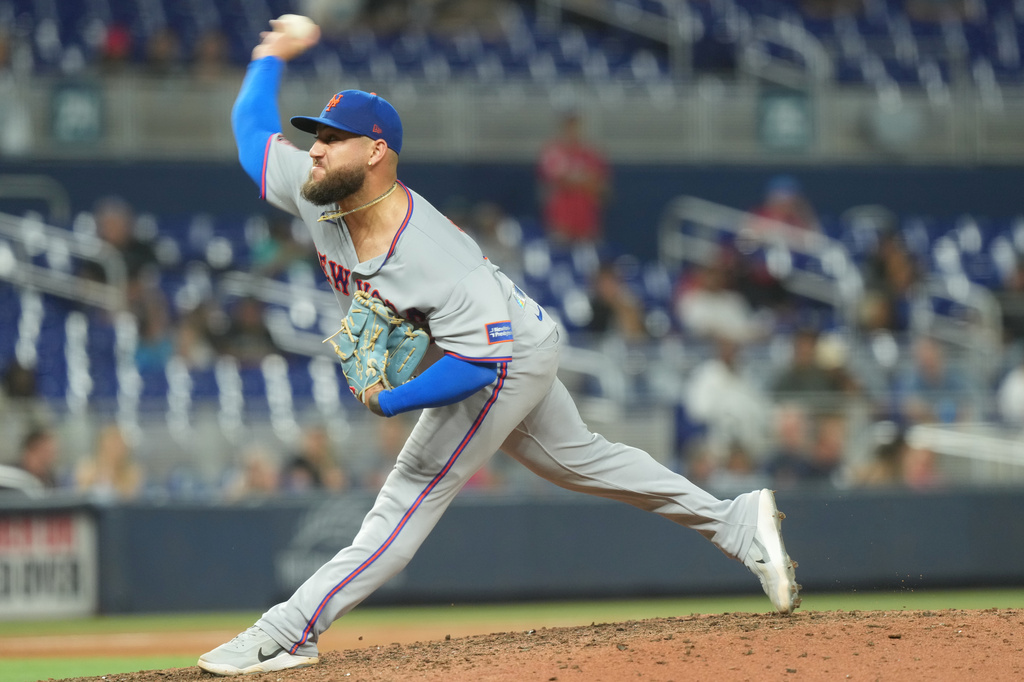 New York Mets pitcher Daniel Duarte aims a pitch during the seventh inning of a baseball game against the Miami Marlins Wednesday, Sept. 9, 2026, in Miami. (AP Photo/Marta Lavandier)