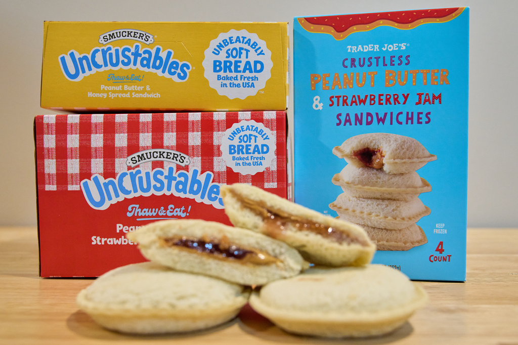 FILE - Crust-less sandwiches from Smucker's and Trader Joe's are displayed on Oct. 15, 2025, in Detroit. (AP Photo/Ryan Sun, File)