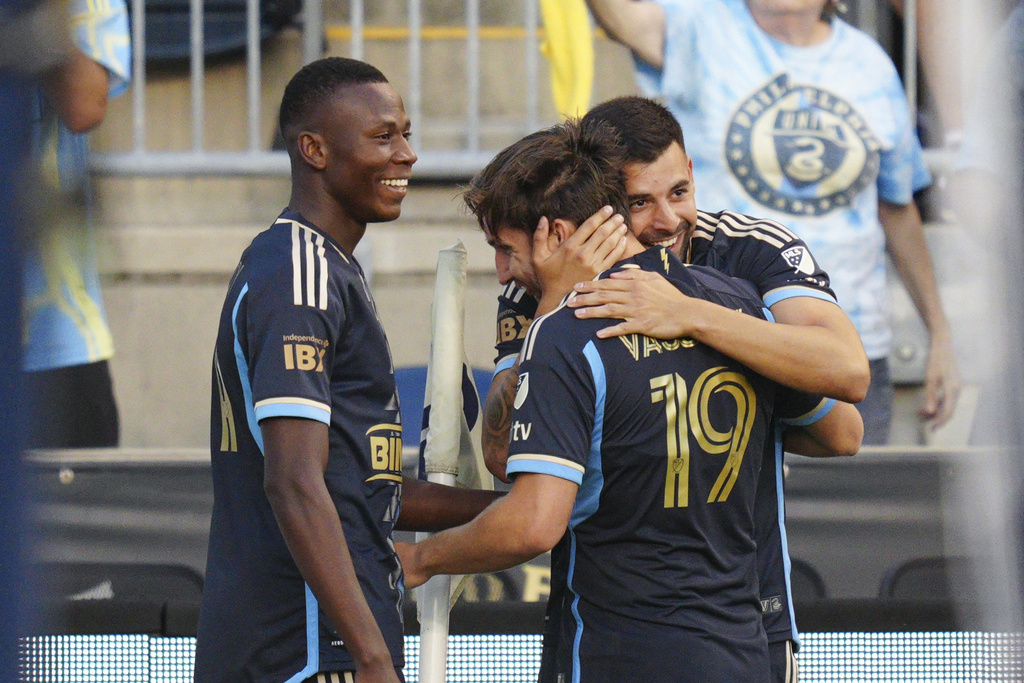 Philadelphia Union's Indiana Vassilev (19) celebrates after his goal with teammates during the first half of an MLS soccer match against the Toronto FC, Saturday, Aug. 9, 2025, in Chester, Pa. (AP Photo/Derik Hamilton)