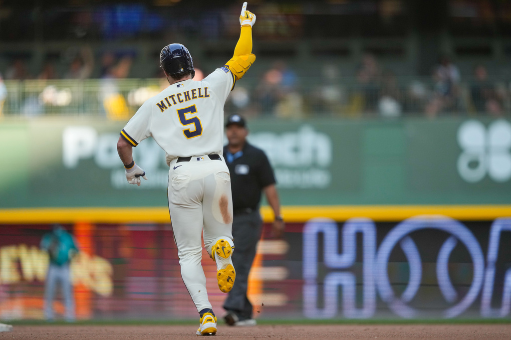 Milwaukee Brewers' Garrett Mitchell reacts to hitting a home run during the eighth inning of a baseball game against the Seattle Mariners Thursday, Aug. 20, 2026, in Milwaukee. (AP Photo/Kayla Wolf)