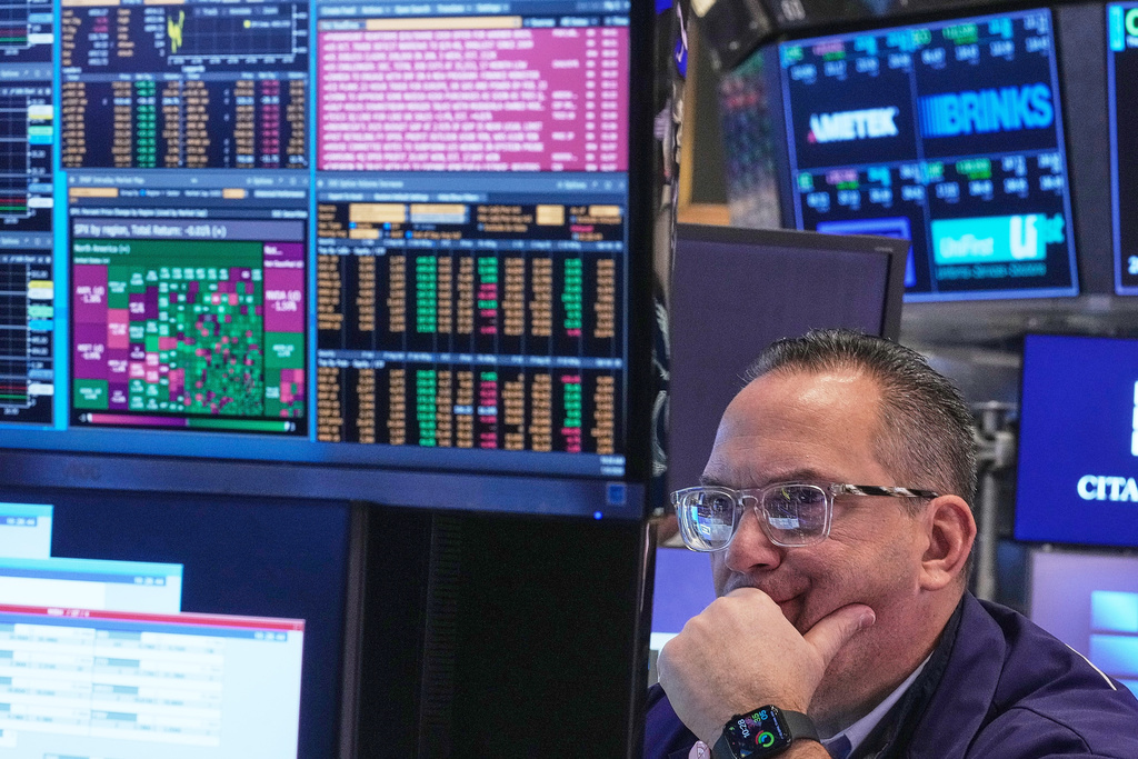 Specialist Anthony Matesic works on the floor of the New York Stock Exchange, Thursday, Jan. 8, 2026. (AP Photo/Richard Drew)