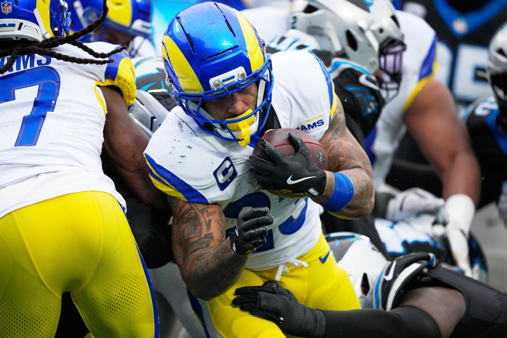 Los Angeles Rams running back Kyren Williams scores against the Carolina Panthers during the second half of an NFL football game, Sunday, Nov. 30, 2025, in Charlotte, N.C. (AP Photo/Jacob Kupferman)