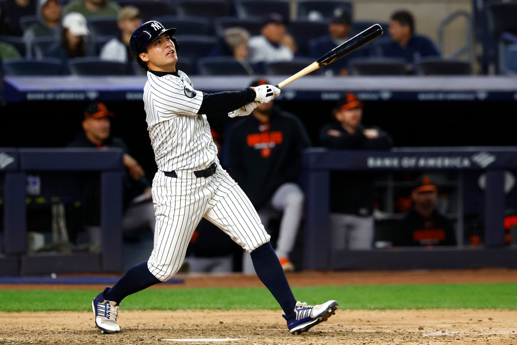 New York Yankees' Anthony Volpe follows through on an RBI double against the Baltimore Orioles during the sixth inning of the second baseball game of a doubleheader, Friday, Sept. 25, 2026, in New York. (AP Photo/Noah K. Murray)