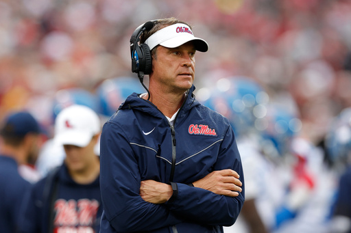 Mississippi head coach Lane Kiffin watches his team play against Oklahoma during the first half of an NCAA college football game in Norman, Okla., Saturday, Oct. 25, 2025. (AP Photo/Alonzo Adams) Mississippi head coach Lane Kiffin watches his team play against Oklahoma during the first half of an NCAA college football game in Norman, Okla., Saturday, Oct. 25, 2025. (AP Photo/Alonzo Adams)