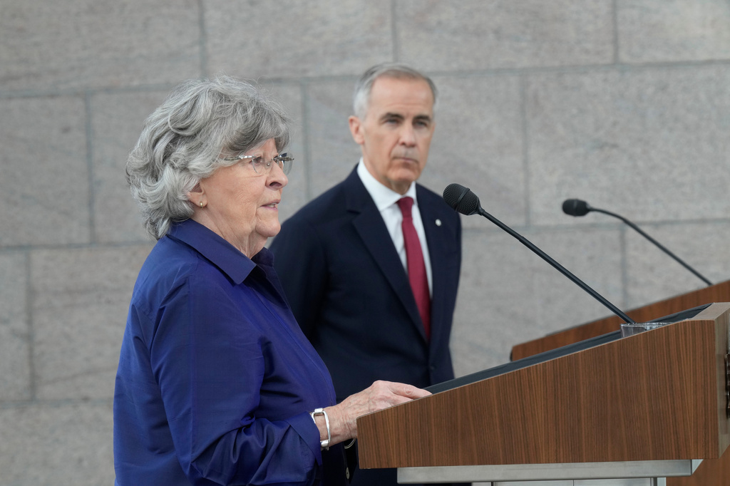Canada Prime Minister Mark Carney and Louise Arbour take part in an announcement in Ottawa on Tuesday, May 5, 2026. (Adrian Wyld/The Canadian Press via AP)