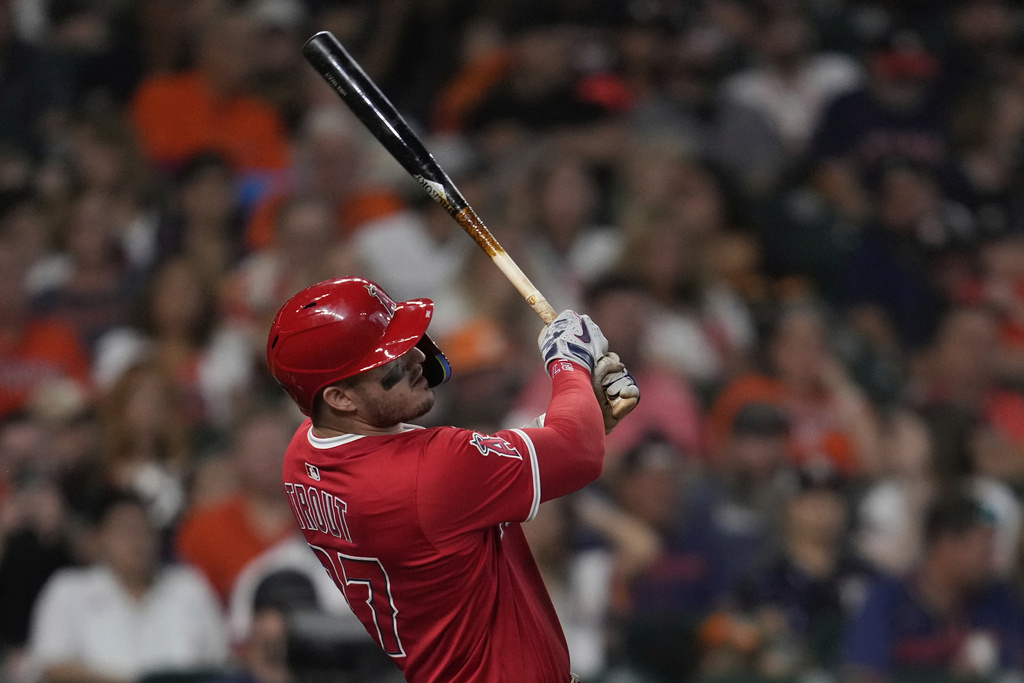 Los Angeles Angels designated hitter Mike Trout doubles during the eighth inning of a baseball game against the Houston Astros in Houston, Sunday, Aug. 31, 2025. (AP Photo/Ashley Landis)