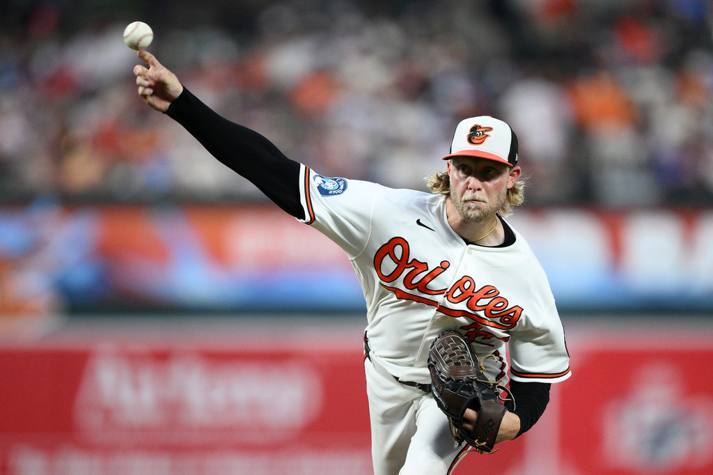 Baltimore Orioles pitcher Shane Baz throws during the third inning of a baseball game against the Philadelphia Phillies, Saturday, Aug. 1, 2026, in Baltimore. (AP Photo/Nick Wass)