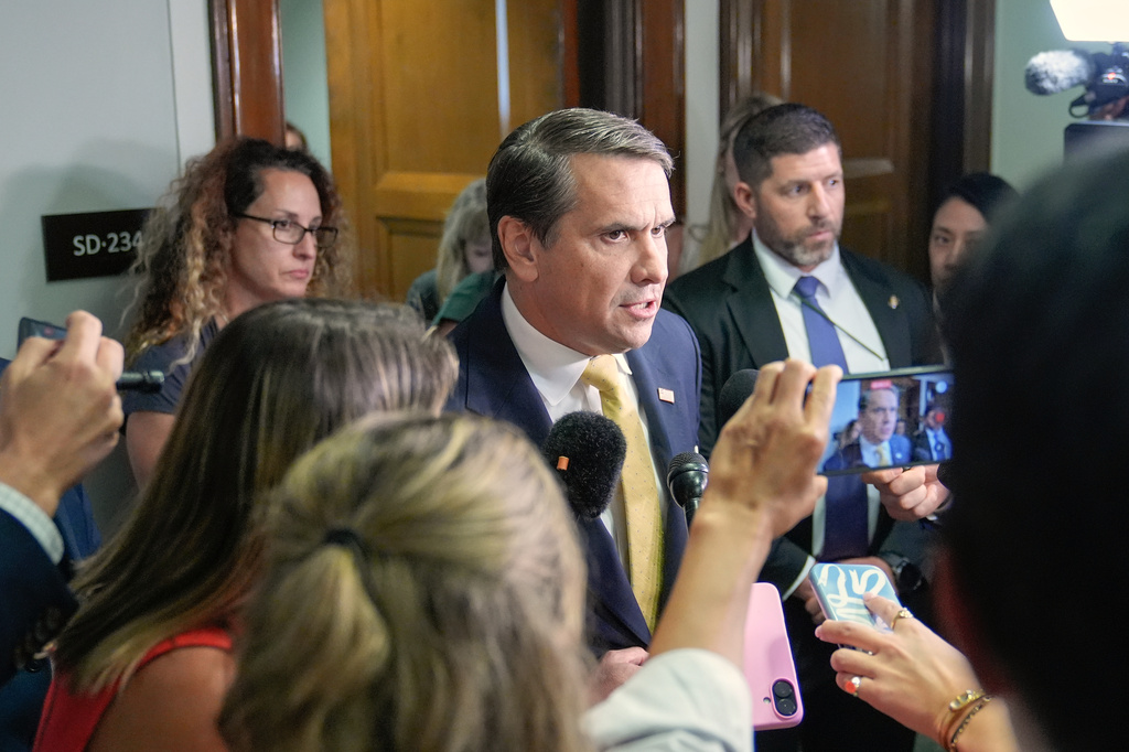 Acting Attorney General Todd Blanche talks with reporters after attending a meeting related to survivors of convicted sex offender Jeffrey Epstein, in Washington, Thursday, July 16, 2026. (AP Photo/Mariam Zuhaib)