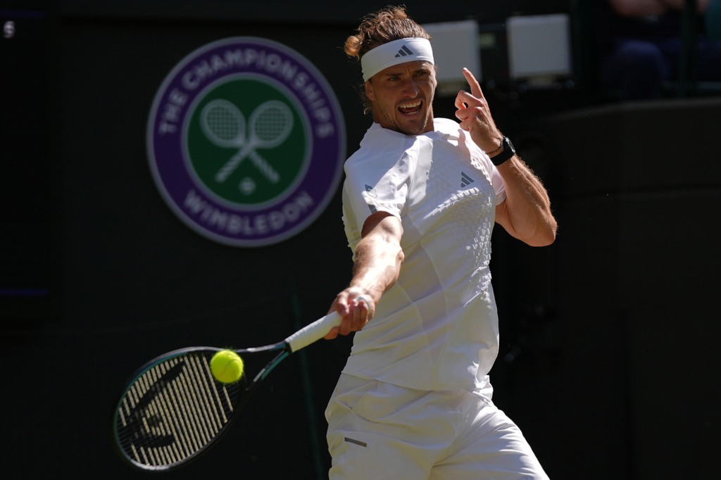 Alexander Zverev of Germany returns the ball to Valentin Royer of France in their second round men's singles match at the Wimbledon Tennis Championships in London, Thursday, July 2, 2026. (AP Photo/Maja Smiejkowska)