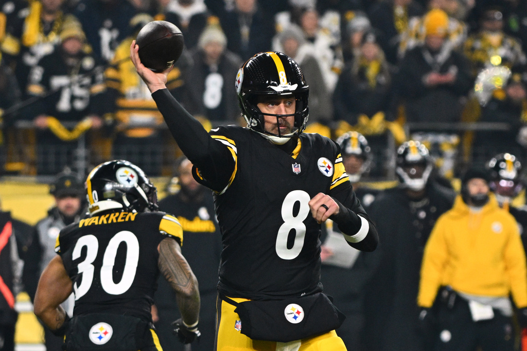 Pittsburgh Steelers quarterback Aaron Rodgers (8) throws during the first half of an NFL wild-card playoff football game against the Houston Texans, Monday, Jan. 12, 2026, in Pittsburgh. (AP Photo/Justin Berl)