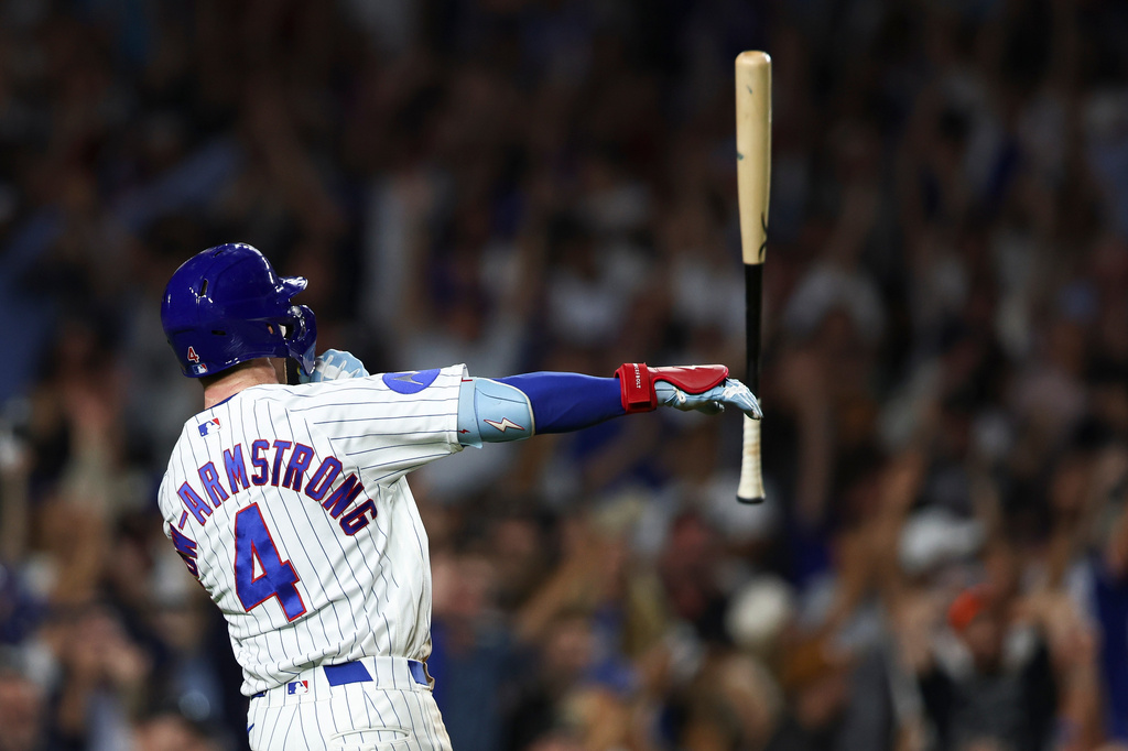 Chicago Cubs' Pete Crow-Armstrong tosses his bat after hitting a walkoff home run during the 10th inning of a baseball game to defeat the Chicago White Sox in Chicago, Monday, Aug. 17, 2026. (AP Photo/Jessie Alcheh)