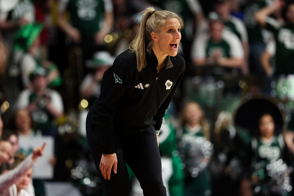 Green Bay head coach Kayla Karius reacts during the first half in the first round of the NCAA college basketball tournament against Minnesota, Friday, March 20, 2026, in Minneapolis. (AP Photo/Matt Krohn)