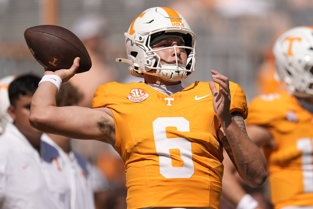Tennessee quarterback Joey Aguilar (6) warms up before an NCAA college football game against Georgia, Saturday, Sept. 13, 2025, in Knoxville, Tenn. (AP Photo/George Walker IV)
