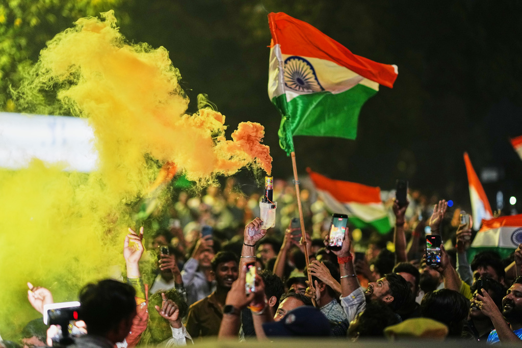 Cricket fans celebrate after India defeated New Zealand final match of T20 World Cup in Lucknow Uttar Pradesh state, India, Sunday, March 8, 2026. (AP Photo/Rajesh Kumar Singh)