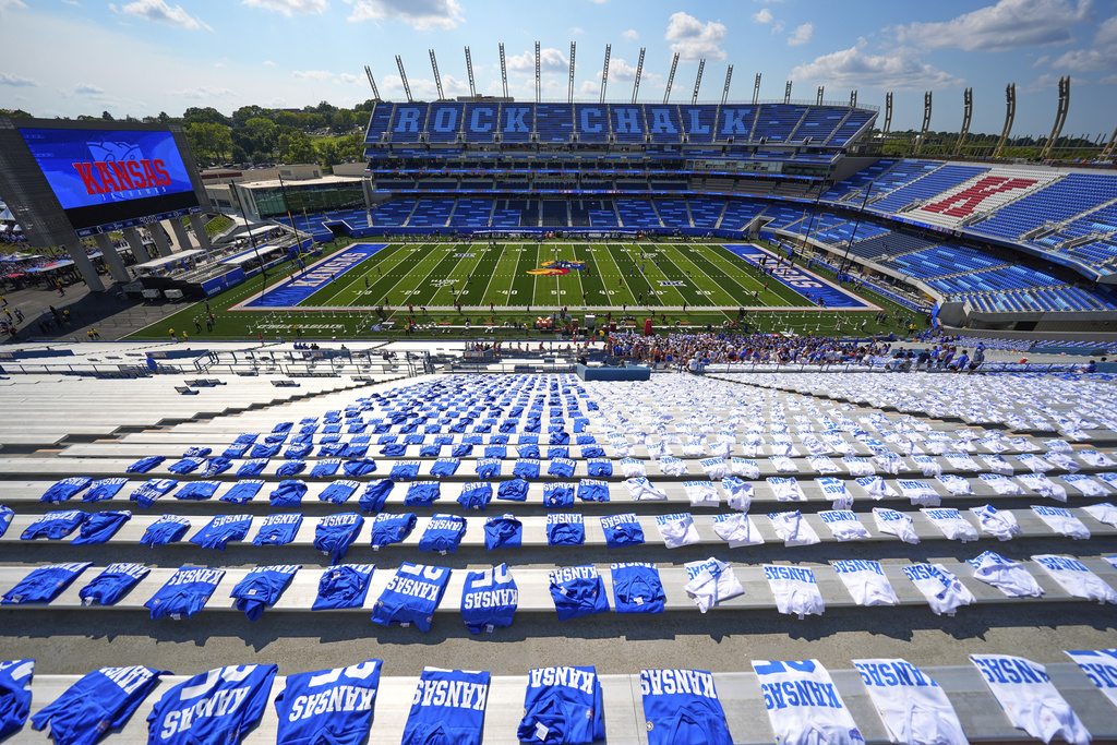 The new David Booth Memorial Stadium awaits fans before an NCAA college football game between Kansas and Fresno State, Saturday, Aug. 23, 2025, in Lawrence, Kan. (AP Photo/Charlie Riedel)