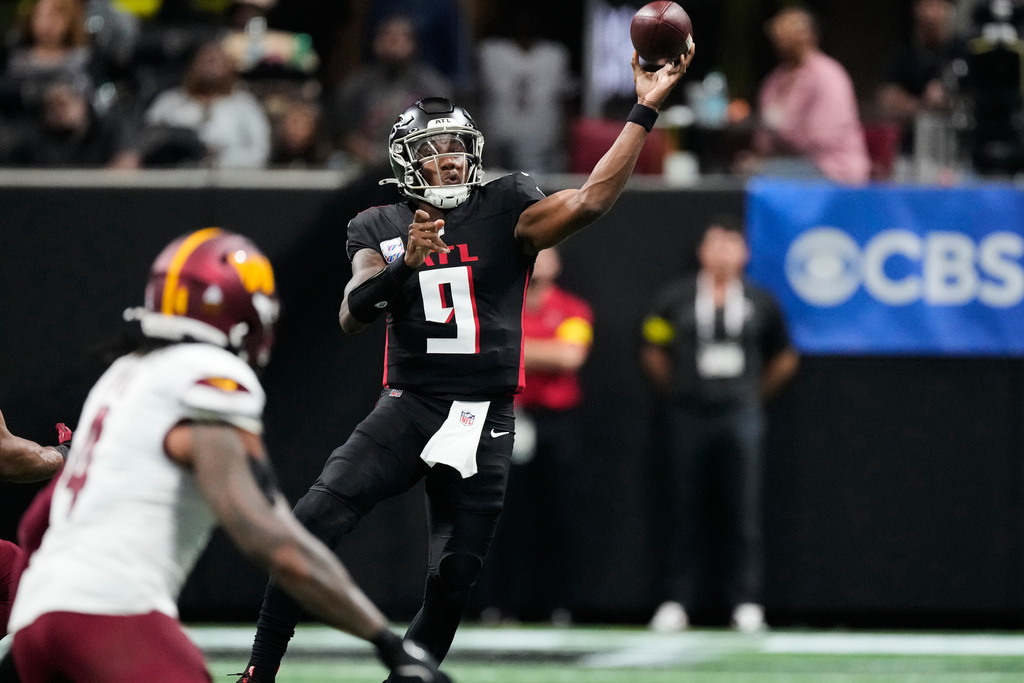 Atlanta Falcons quarterback Michael Penix Jr. (9) throws against the Washington Commanders during the first half of an NFL football game, Sunday, Sept. 28, 2025, in Atlanta. (AP Photo/Brynn Anderson)