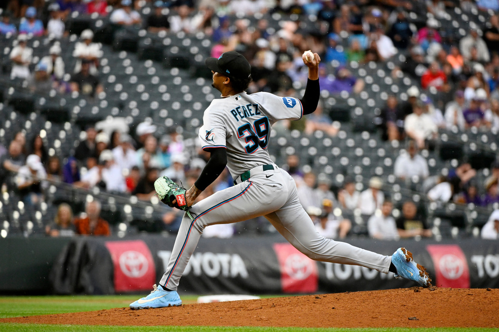 Miami Marlins starting pitcher Eury Pérez throws in the first inning of a baseball game against the Colorado Rockies Tuesday, June 30, 2026, in Denver. (AP Photo/Geneva Heffernan)